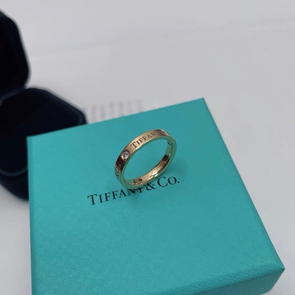 Tiffany & Co. Gold Ring with Diamond Accents - Picture 3 of 3